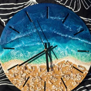 Instructor leading ocean resin clock art workshop