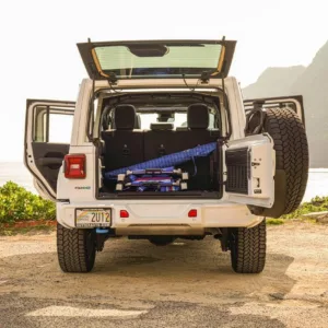 Jeep parked with scenic island background