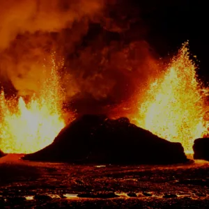 Tour guide explaining volcanic features at night
