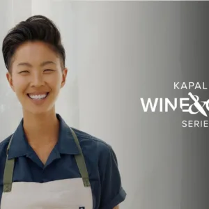 Chef Kristen Kish cooking at wine and chef event