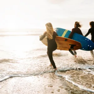 Surfer catching wave during ocean adventure