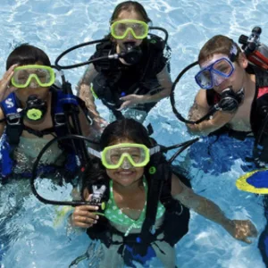 Diver preparing for a thrilling black water night dive