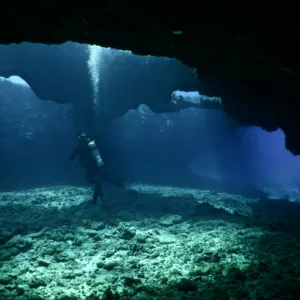 Exploring lava tubes and shipwrecks on Oahu scuba dive
