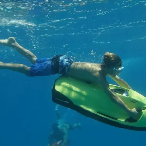 Riding the Seabob and snorkeling in vibrant ocean spots