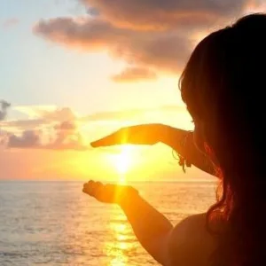 Couple enjoying serene sunset on luxury cruise boat