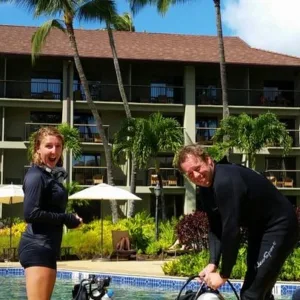 Beginner scuba divers practicing skills in pool at Sheraton Kauai
