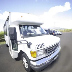 Private van driving along Oahu coastal road