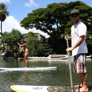 Semi-private SUP lesson with small group on tranquil bay