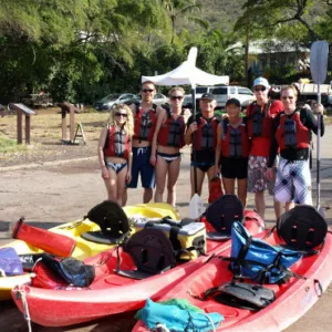 Kayakers paddling through Kealakekua Bay clear waters