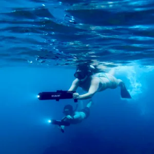 Scuba jet speeding through Turtle Town waters with photo gear