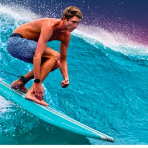 Soft top surfboard resting on sandy beach