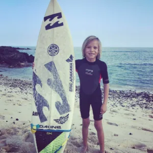 Individual receiving focused private surf instruction