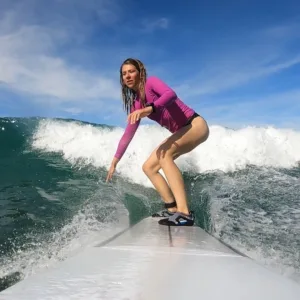 Private surfing lessons on gentle island waves