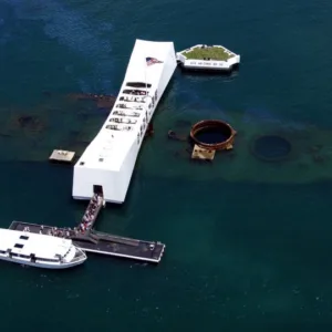 Historic USS Arizona Memorial surrounded by peaceful water