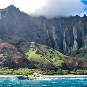 Morning snorkeling tour along the NaPali Coast cliffs