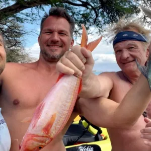 Group enjoying bottom fishing from kayaks in Maui waters