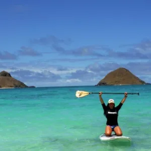 Paddleboarders exploring calm waters along Kohala Coast