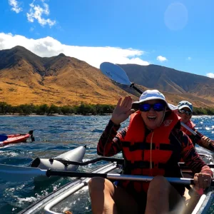 Clear kayak with pontoons ready for snorkeling tour