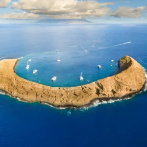 Snorkeling at Molokini crater with clear turquoise waters