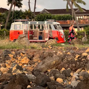 Vintage VW cruising along Maui's scenic coastline