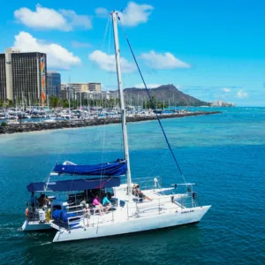 Boat cruise featuring three traditional tiki statues