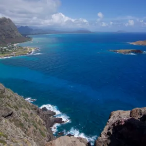 Private tour vehicle driving along Oahu’s scenic coast