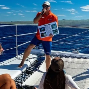 Snorkelers sailing on catamaran during Kona adventure tour