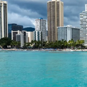 Individual enjoying a private stand up paddle session in Waikiki