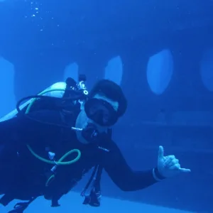 Submarine exploring underwater views near tropical island