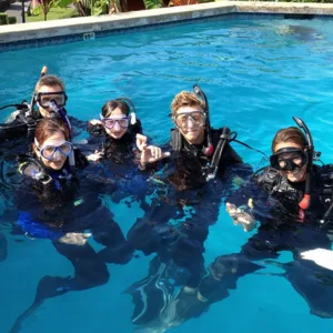 Scuba students practicing pool skills during refresher course