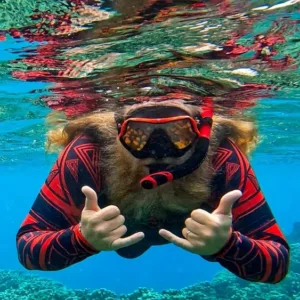 Guided snorkeling tour for beginners exploring colorful reefs