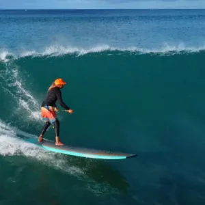 Instructor teaching stand up paddleboarding in a private lesson