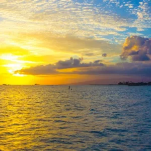 Couple enjoying a private evening cruise at sunset