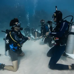 Student learning scuba skills with private instructor in Oahu