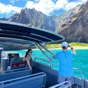 Morning light illuminating Na Pali Coast cliffs and ocean