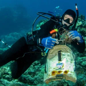 Scuba diver participating in PADI Dive Against Debris event