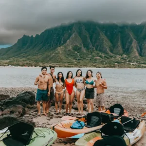 Kayaks and beach gear ready for half-day rental fun