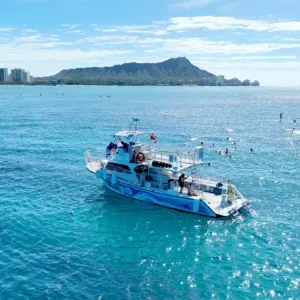 Island Breeze private boat cruising Waikiki’s turquoise waters