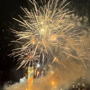 Crowd celebrating Fourth of July on Waikiki cruise