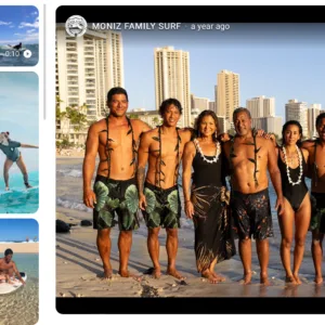 Family taking beginner surf lesson on gentle Hawaii beach waves