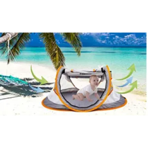 Beach cabana providing shade for baby on sunny day