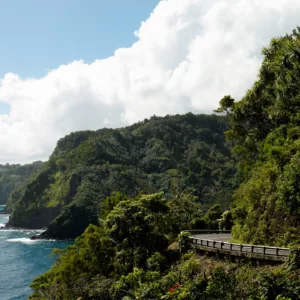 Luxury SUV driving along scenic Road to Hana route