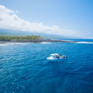Scuba divers preparing for long range two tank morning dive