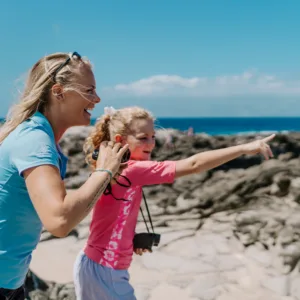 Humpback whale breaching the ocean surface during whale watch
