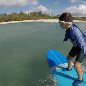 Surfer catching waves during one-hour surf lesson in Kapolei