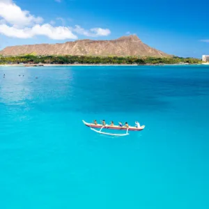 Canoe charter exploring tranquil island waterways and coastline