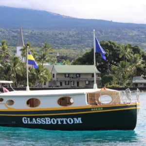 Glass bottom boat cruising along Kona coast