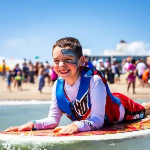 Surf instructor giving private lesson to student
