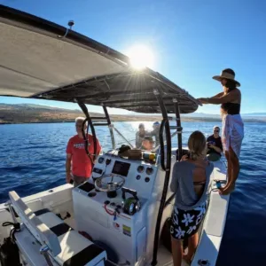 Private boat cruising on calm ocean waters