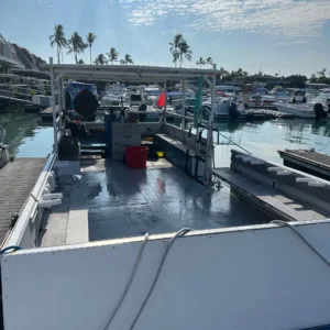 Private boat cruising at sunset in bay